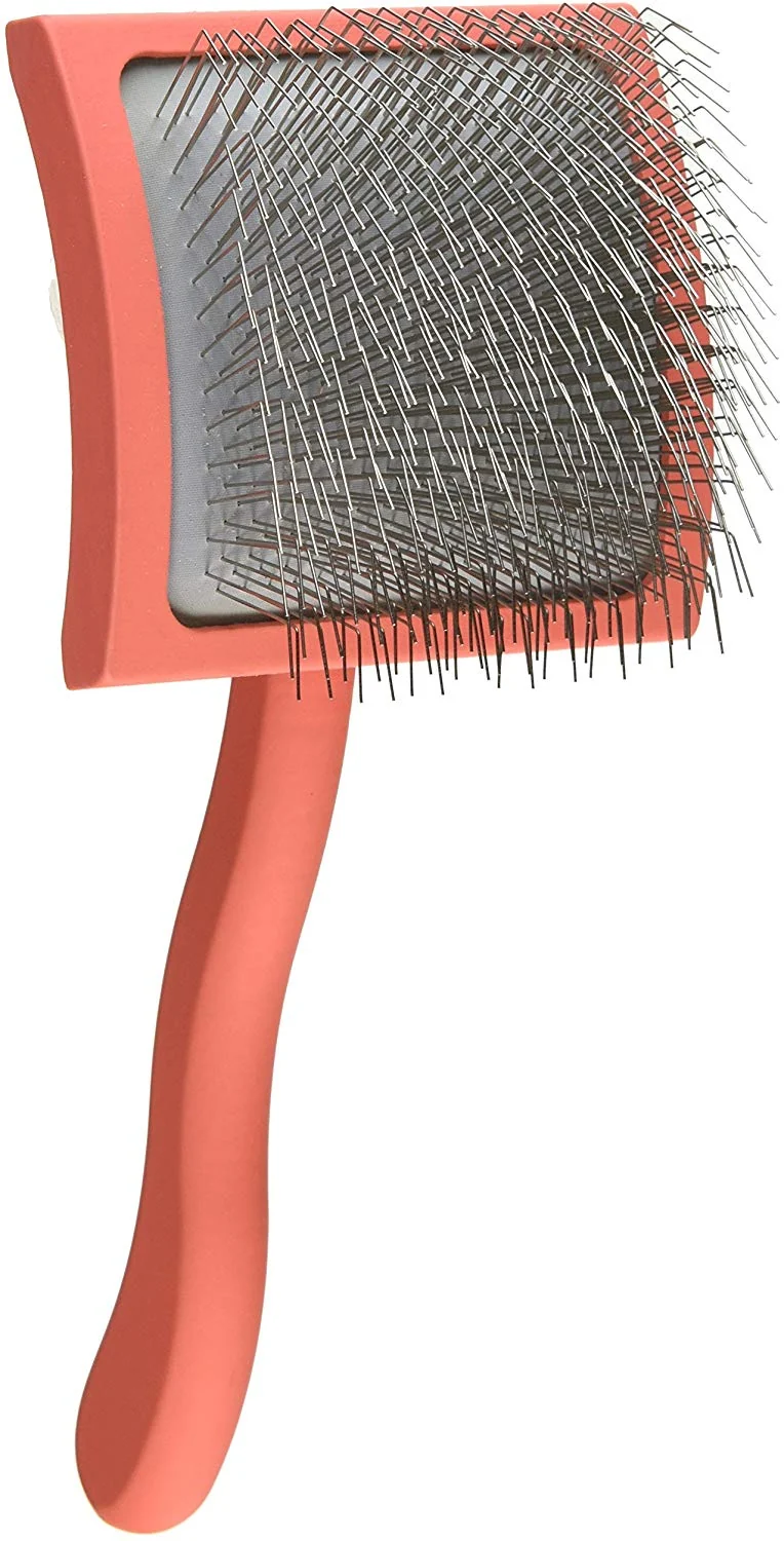 Carda de púas largas de color coral de la marca Chris Christensen