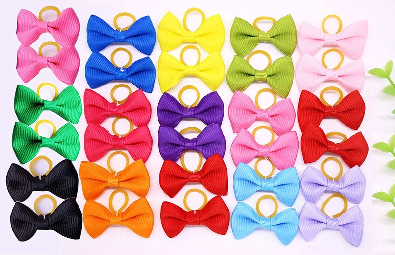 yagopet 20pcs Nuevo Perro lazos topknot sólido pequeño bowknot con bandas de goma parte superior calidad Pet Grooming Productos Combinación Pure Colores lazos de pelo de mascotas perro accesorios para el pelo