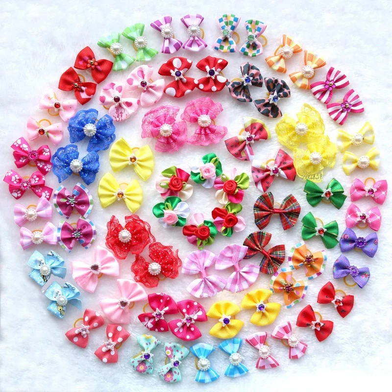 Gomas de pelo en forma de lazo para mascotas, adornadas con pedrería, perlas y flores, diferentes colores, accesorios de belleza para mascotas