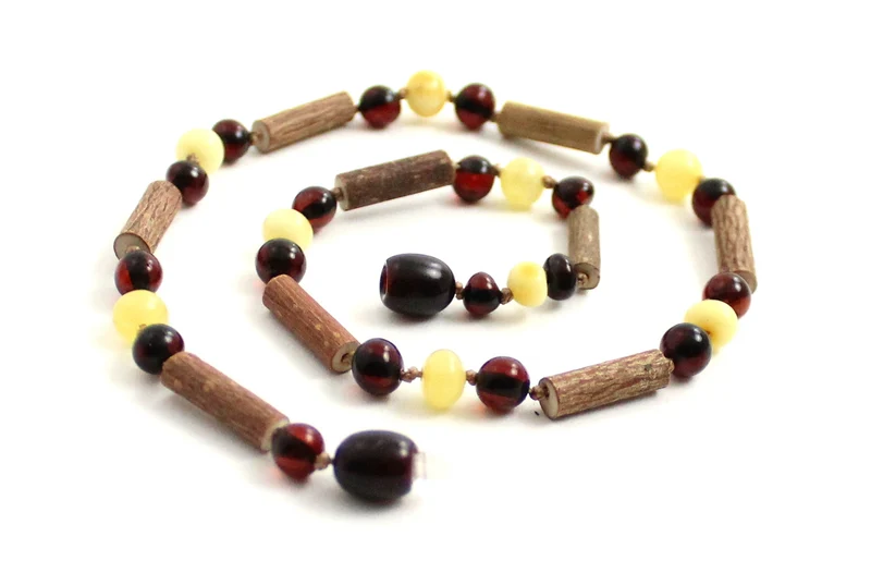 Collar de dentición NBBP-H6 con ámbar pulido y avellana