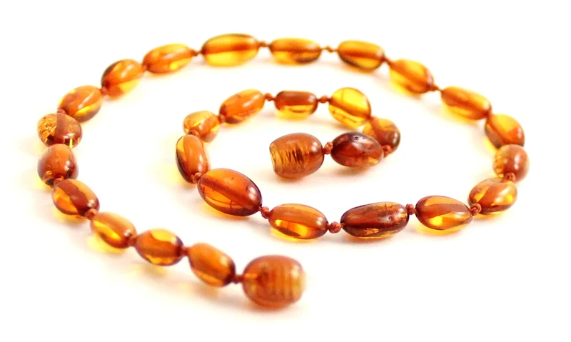 Collar calmante para bebé Bean Amber Cognac