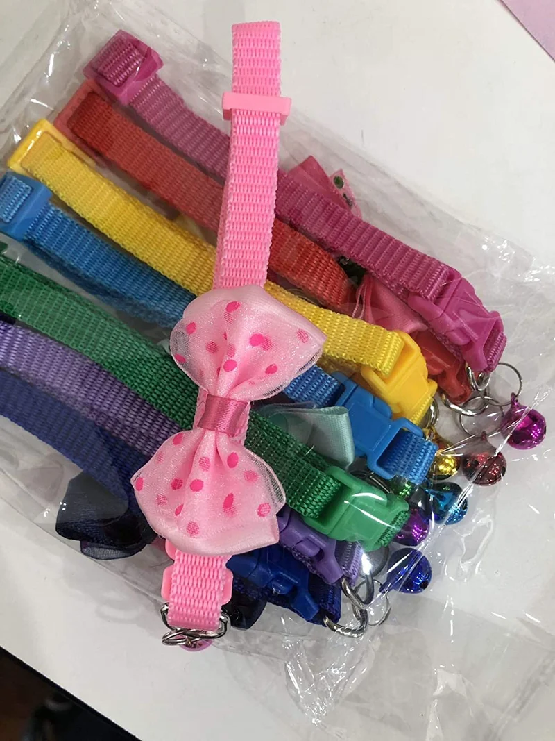 Yasma - Collar de gato con campana de 8 piezas, sólido y seguro, nailon, colores variados